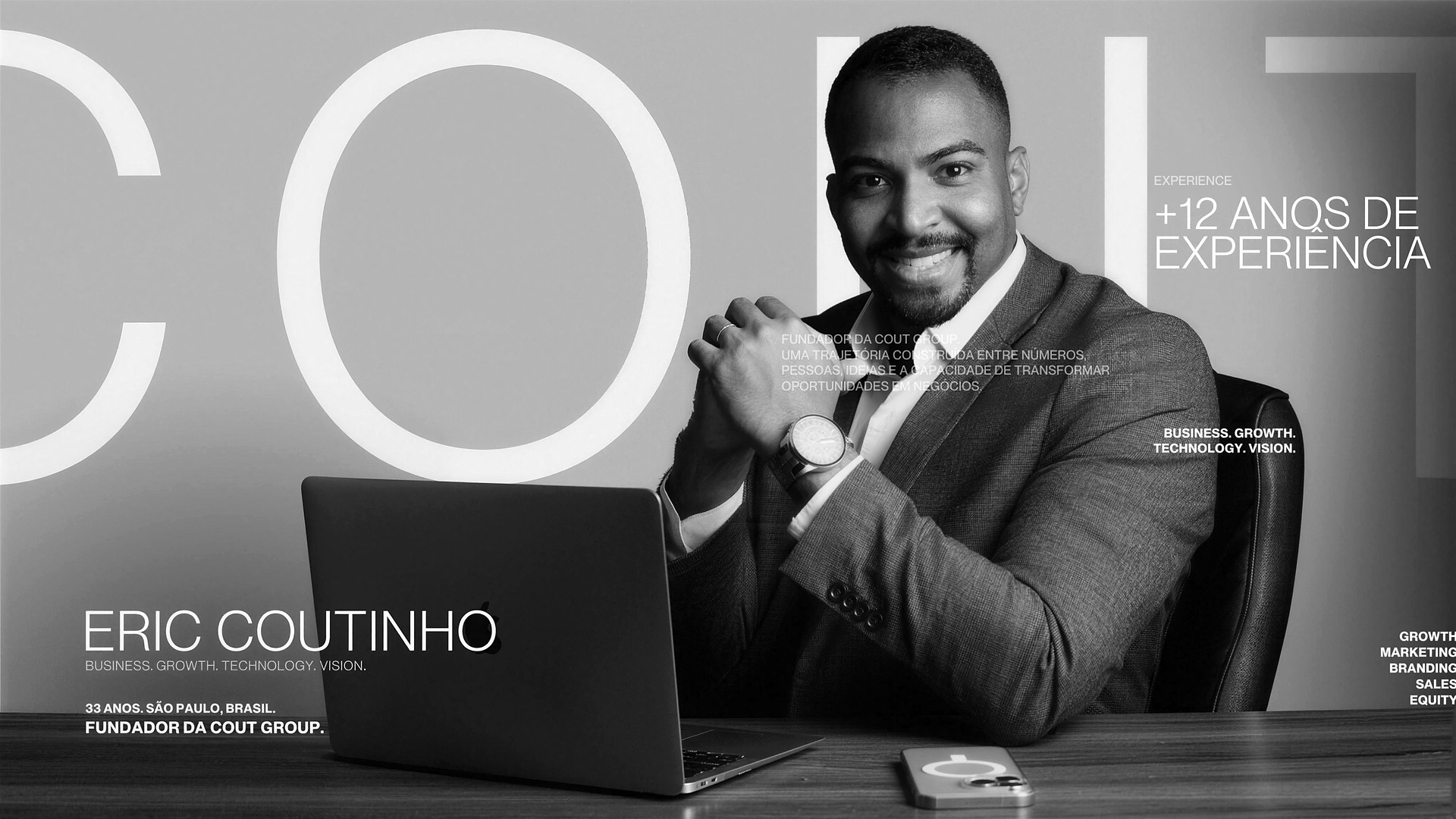 Eric Coutinho, de terno, sentado à mesa com notebook. 12+ anos de experiência. Business. Growth. Technology. Vision. 33 anos, São Paulo, Brasil. Fundador da COUT Group.